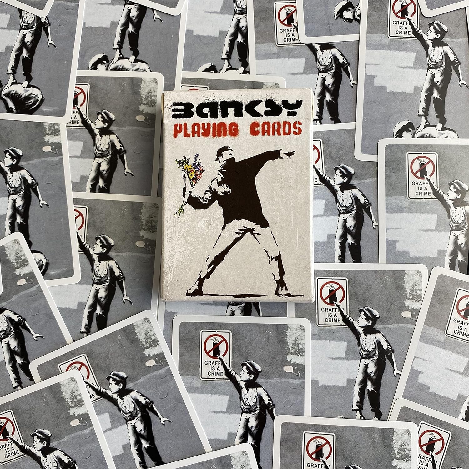 Carte da gioco con disegni di Banksy
